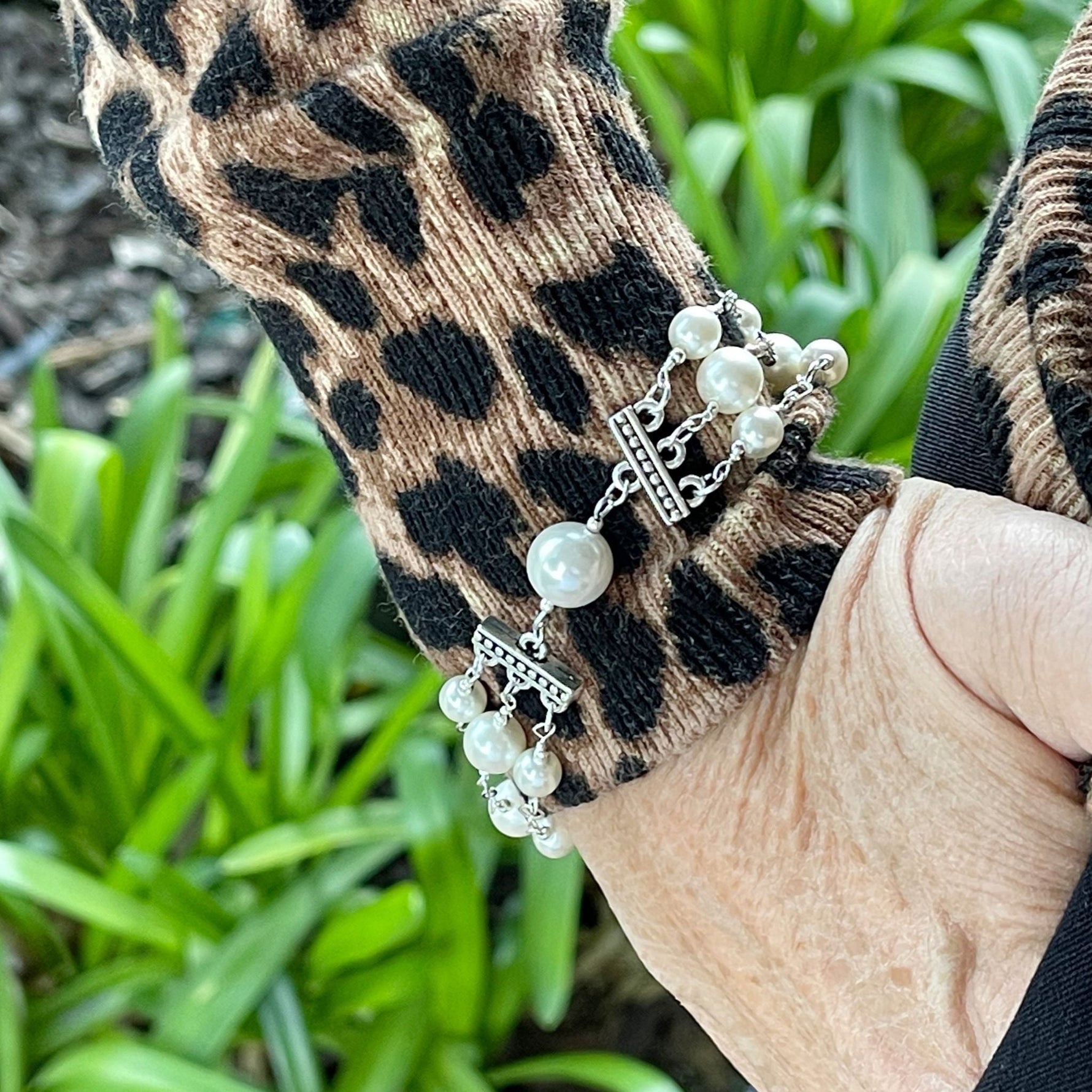 Calla Triple Pearl Bracelet worn on wrist showing elegant layered pearl design