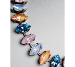 Close up of Capri bracelet showcasing marquis cut Austrian crystals in vibrant colours set in an antique silver tennis design