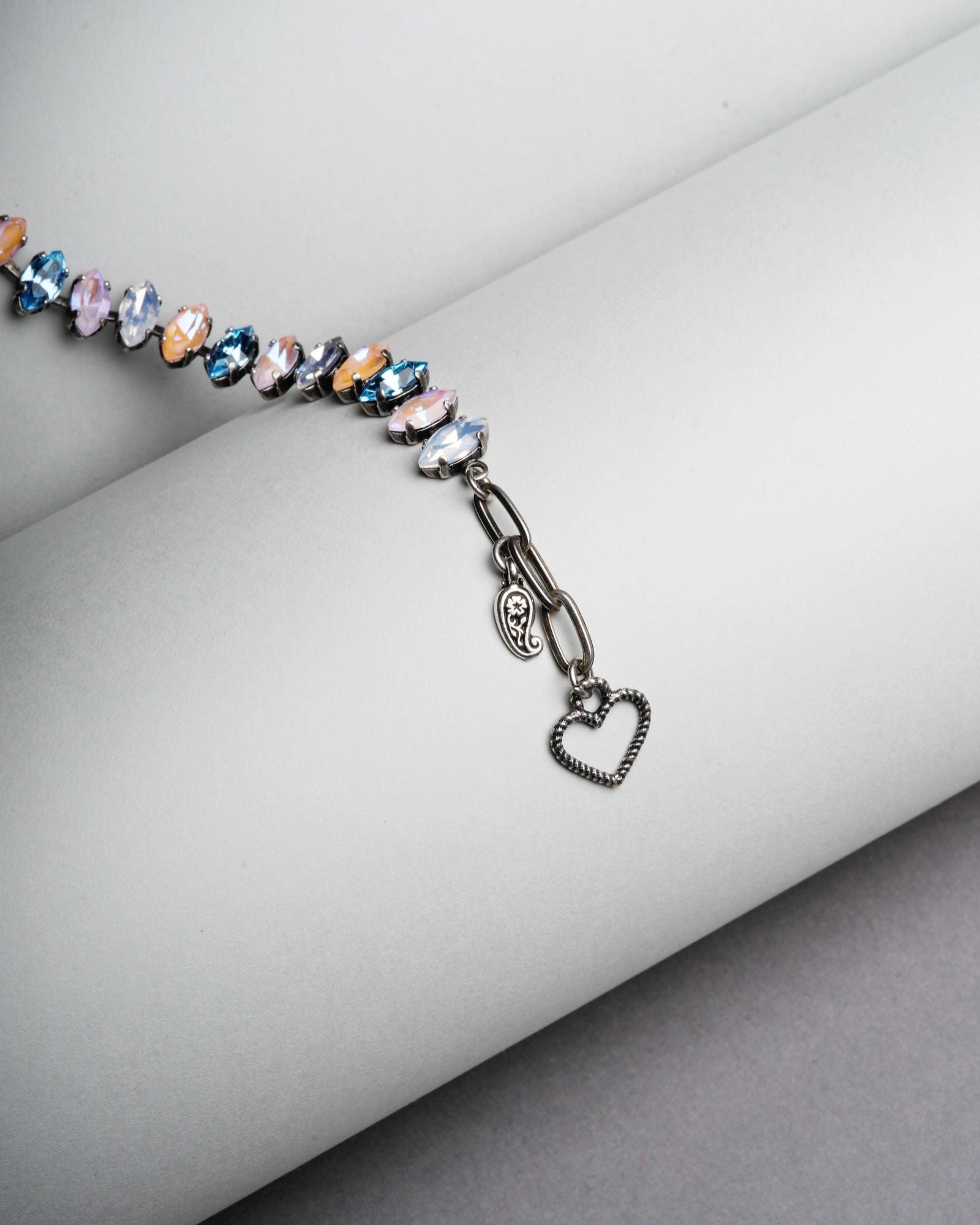 Capri multicolour crystal bracelet featuring antique silver clasp and signature heart charm with refined vintage detailing