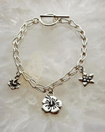 Flora Fine Silver Charm Bracelet – Handcrafted Botanical Elegance - Carabella By Cheryl