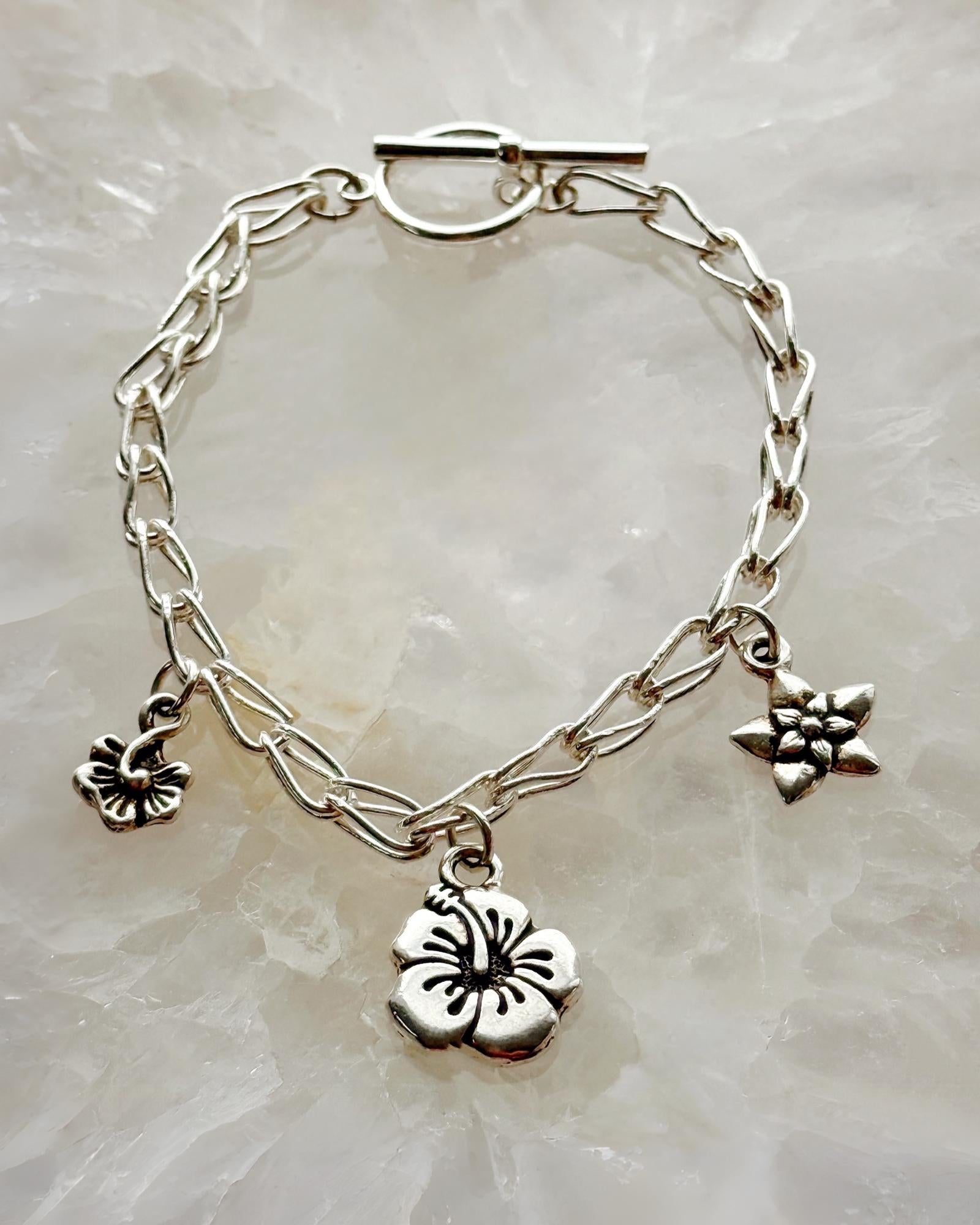 Flora Fine Silver Charm Bracelet – Handcrafted Botanical Elegance - Carabella By Cheryl