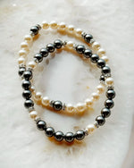 Jan Black Pearl Bracelet paired with Juanita Pearl Bracelet showing black and white pearl contrast