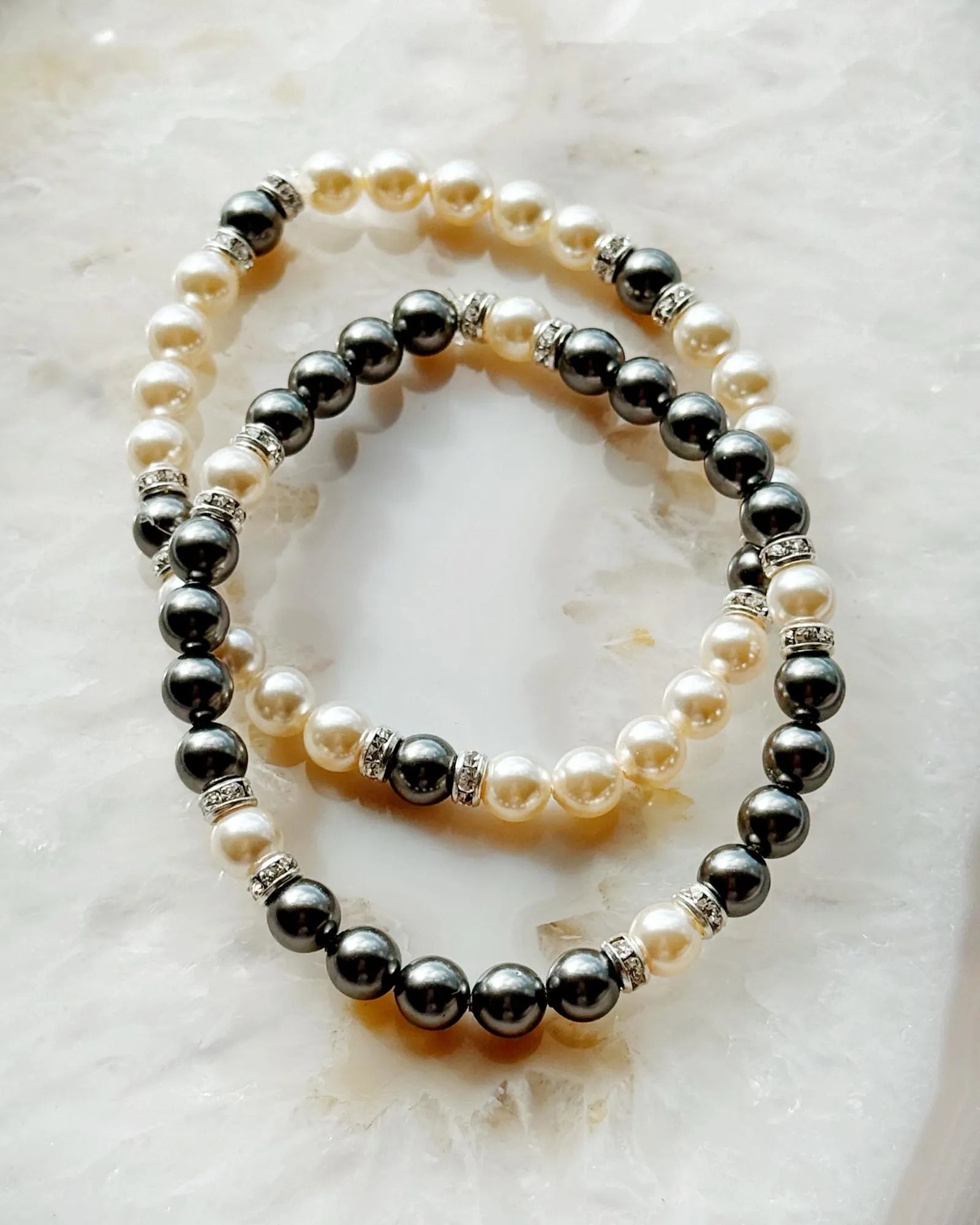 Jan Black Pearl Bracelet paired with Juanita Pearl Bracelet showing black and white pearl contrast