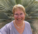 Kailani Freshwater Pearl Necklace worn as an elegant statement, blending organic pearls with delicate gold accents for refined everyday luxury