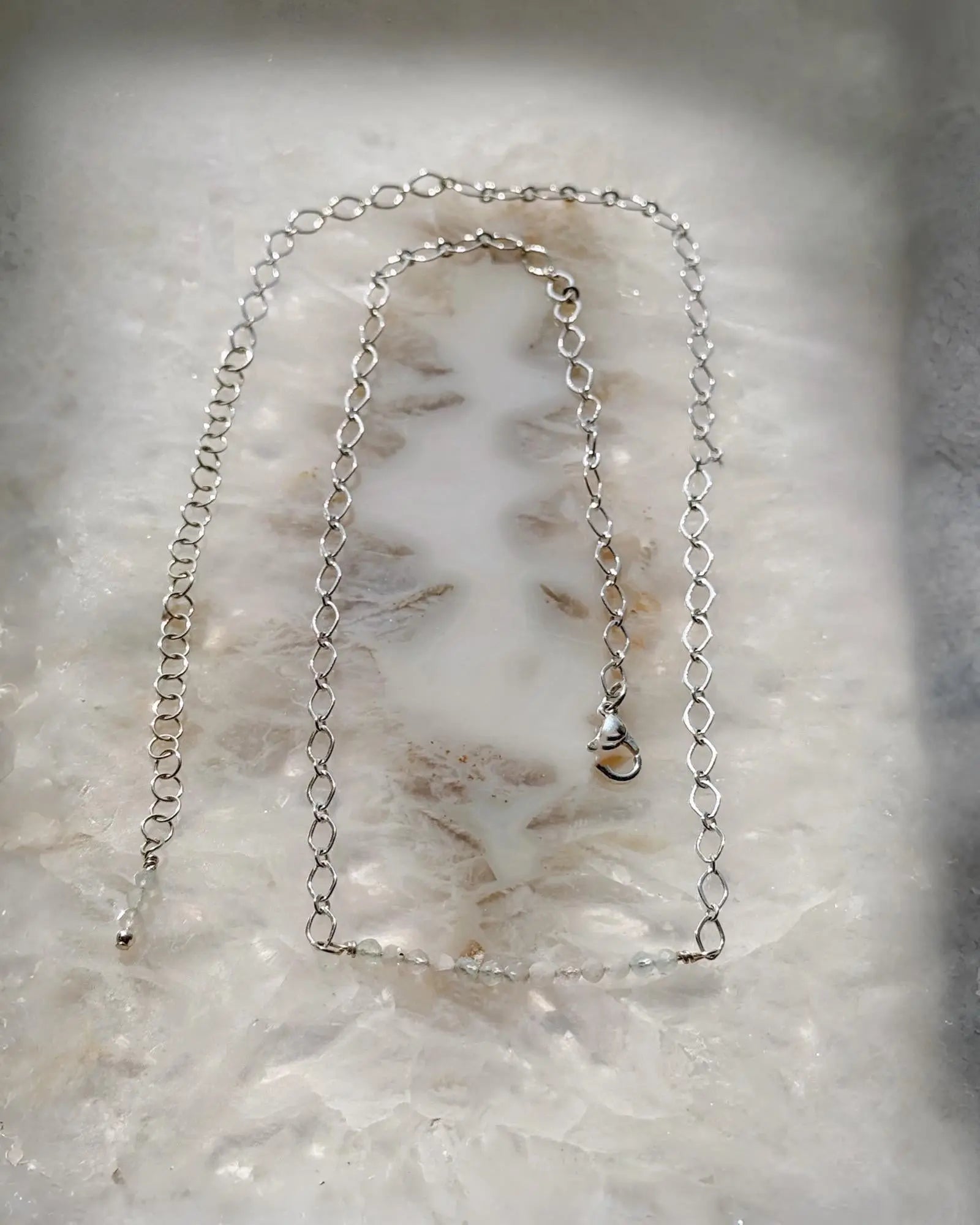 Detail view of the Morganite Gemstone Bar Necklace showing the adjustable silver extension chain and morganite gemstone bar.