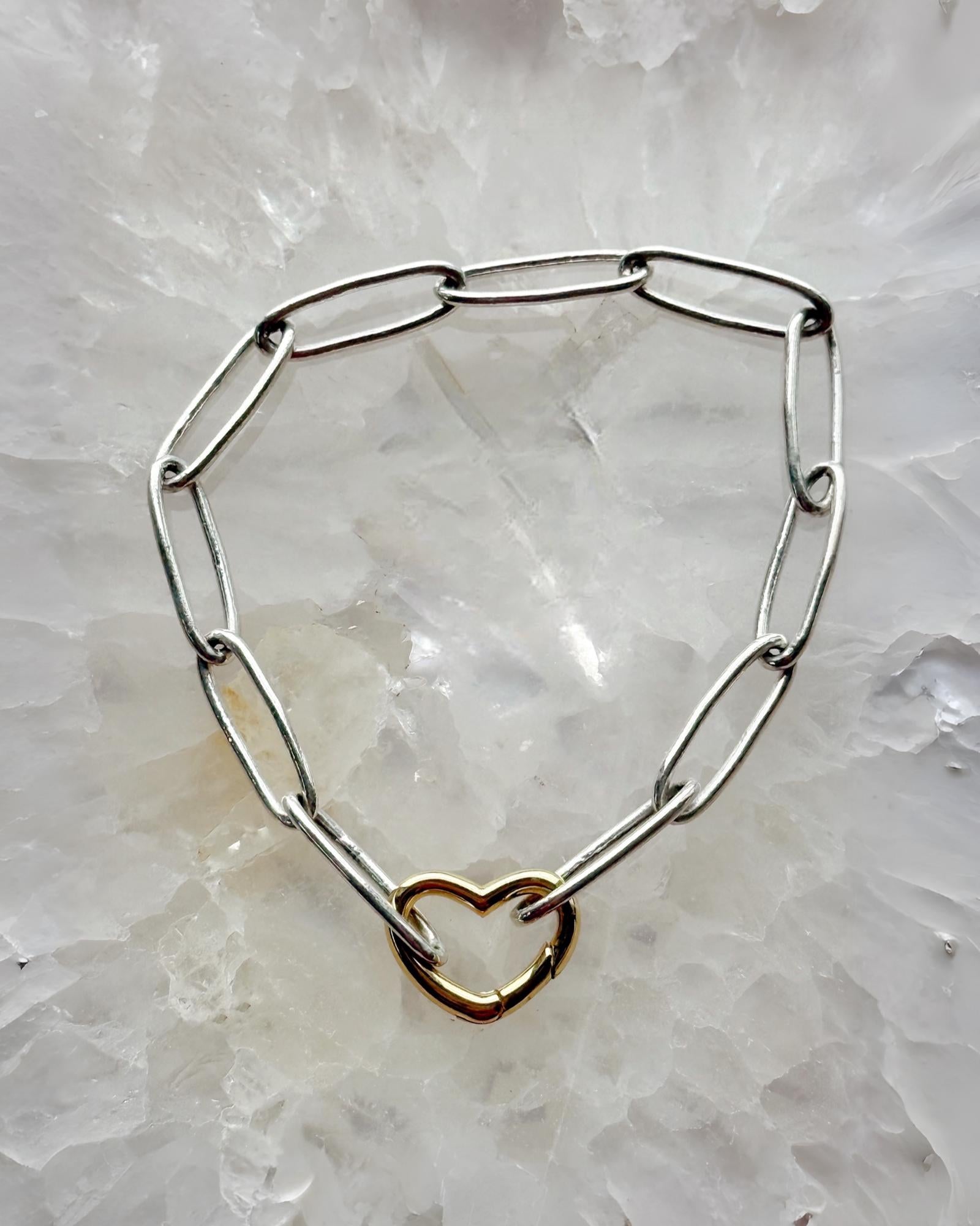 Mixed metal paperclip bracelet with silver chain and gold heart clasp handcrafted in Canada