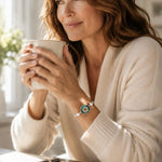 Ava handwoven .999 fine silver bracelet with natural green agate druzy worn during a relaxed morning coffee, styled with a cream cashmere sweater in warm natural light.
