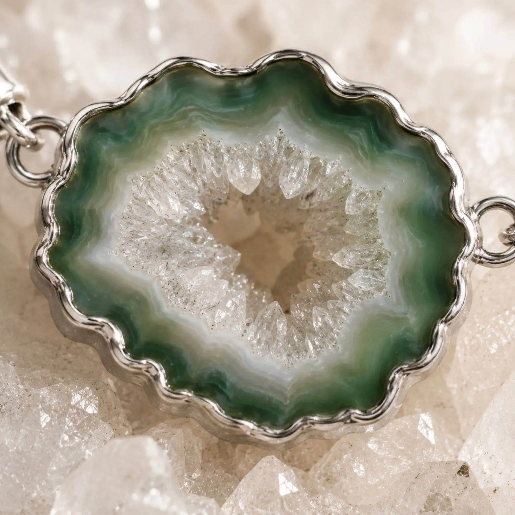 Macro detail of the Ava bracelet's natural green agate druzy, revealing crystalline texture, organic banding, and sterling silver bezel craftsmanship.