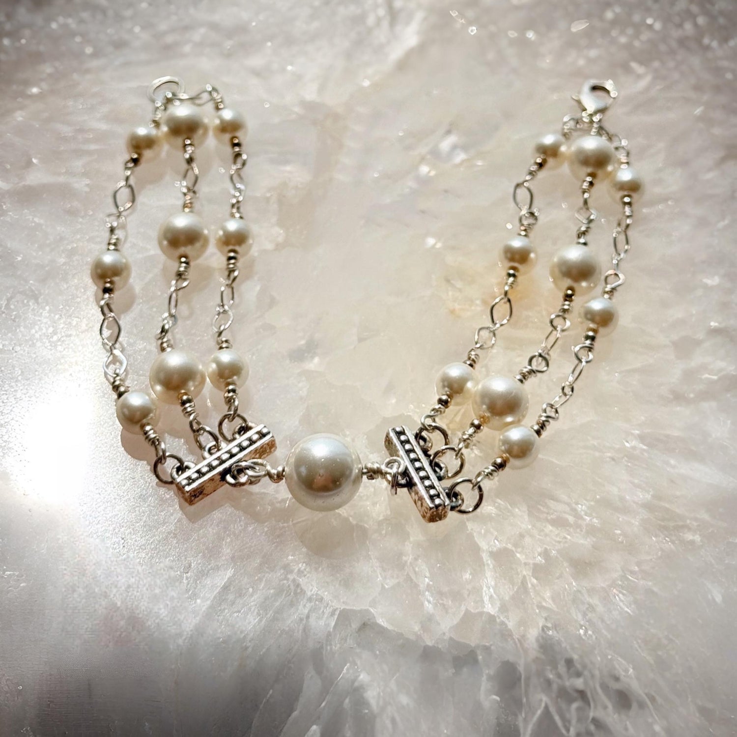 Calla Triple Pearl Bracelet featuring Austrian crystal pearls and sterling silver accents, handcrafted in Canada