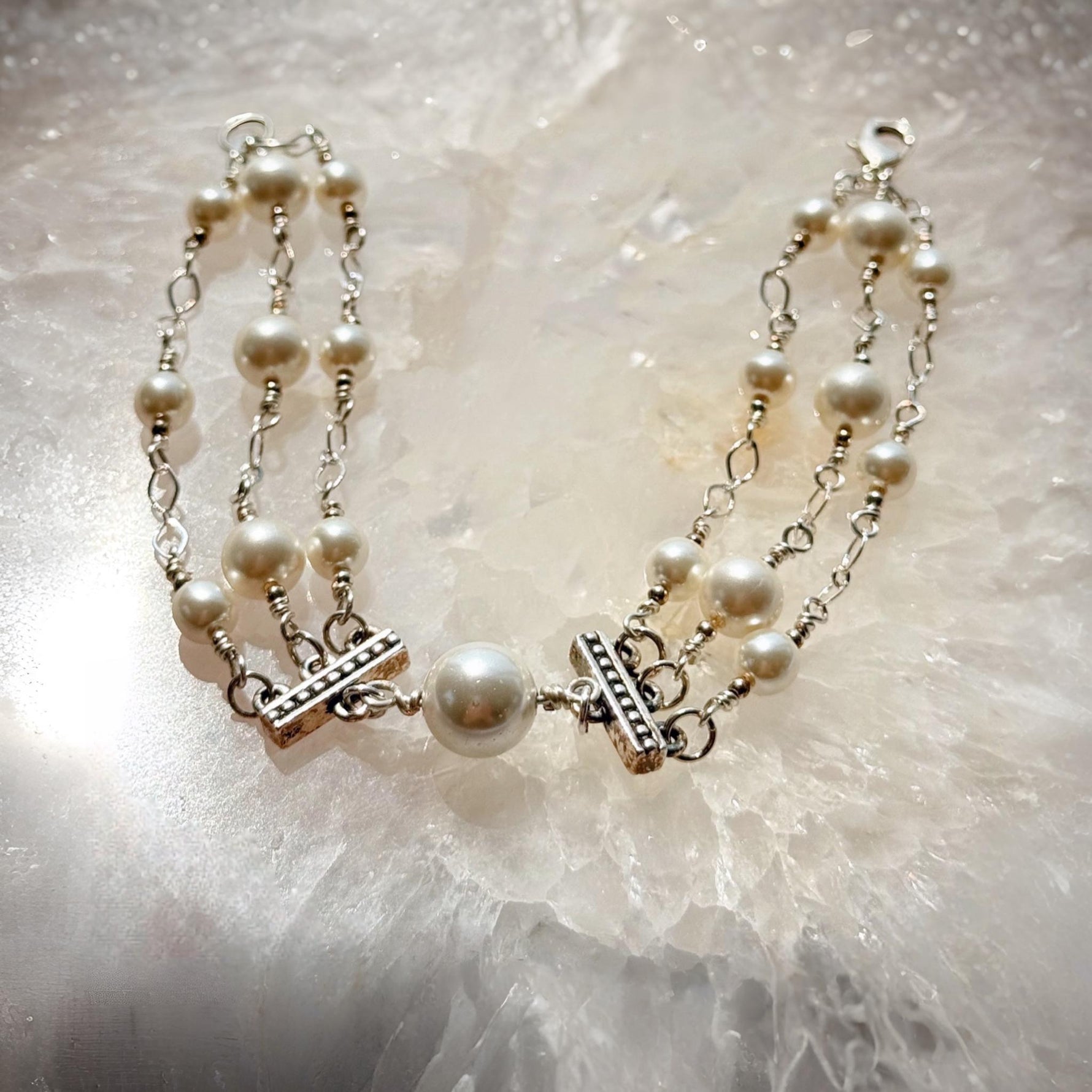 Calla Triple Pearl Bracelet featuring Austrian crystal pearls and sterling silver accents, handcrafted in Canada