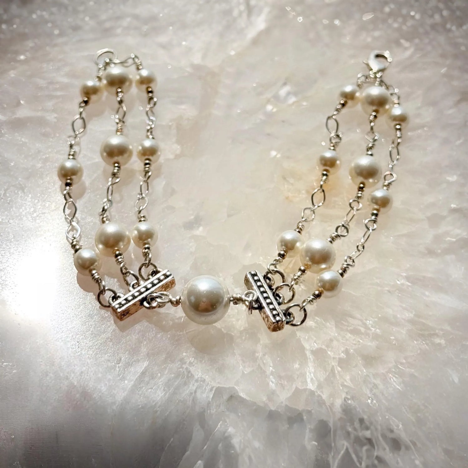 Calla Triple Pearl Bracelet featuring Austrian crystal pearls and sterling silver accents, handcrafted in Canada