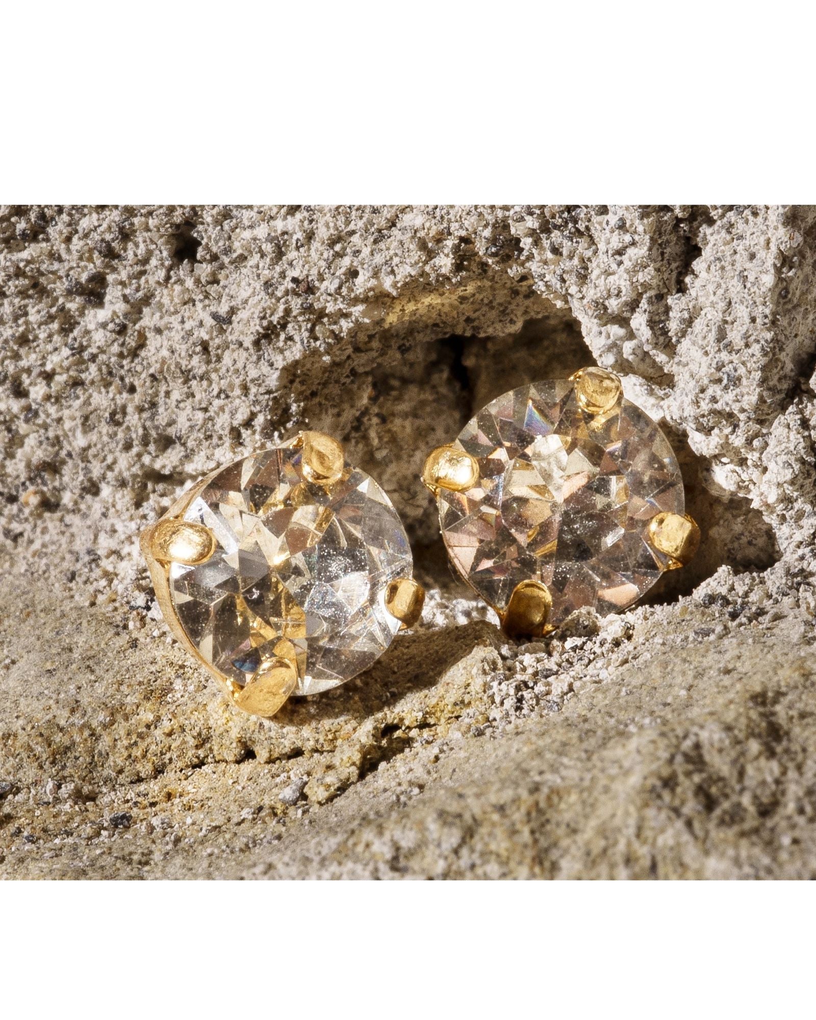 Capri crystal stud earrings with brilliant clear stones in gold settings, handcrafted in Canada and designed for bridal and refined everyday wear.