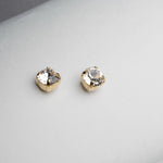 Capri crystal stud earrings in gold, featuring classic round-cut sparkle designed for refined everyday wear.