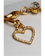 Capri tennis bracelet gold clasp with signature heart charm, highlighting thoughtful design and refined craftsmanship.