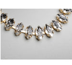 Close-up of marquise-cut crystal stones in the Capri tennis bracelet, showcasing brilliant sparkle and refined gold settings