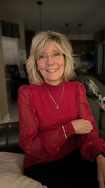 Customer wearing the Eternal Love Heart Necklace by Carabella by Cheryl styled for refined everyday elegance.