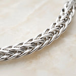 Close-up macro of the Evelyn fine silver bracelet highlighting the intricate handwoven silver links and exceptional craftsmanship.