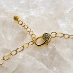 Imperial Blossom Swarovski® Crystal Pearl Necklace clasp detail featuring an adjustable gold-plated lobster clasp, extension chain, and decorative end bead on a white quartz crystal background.