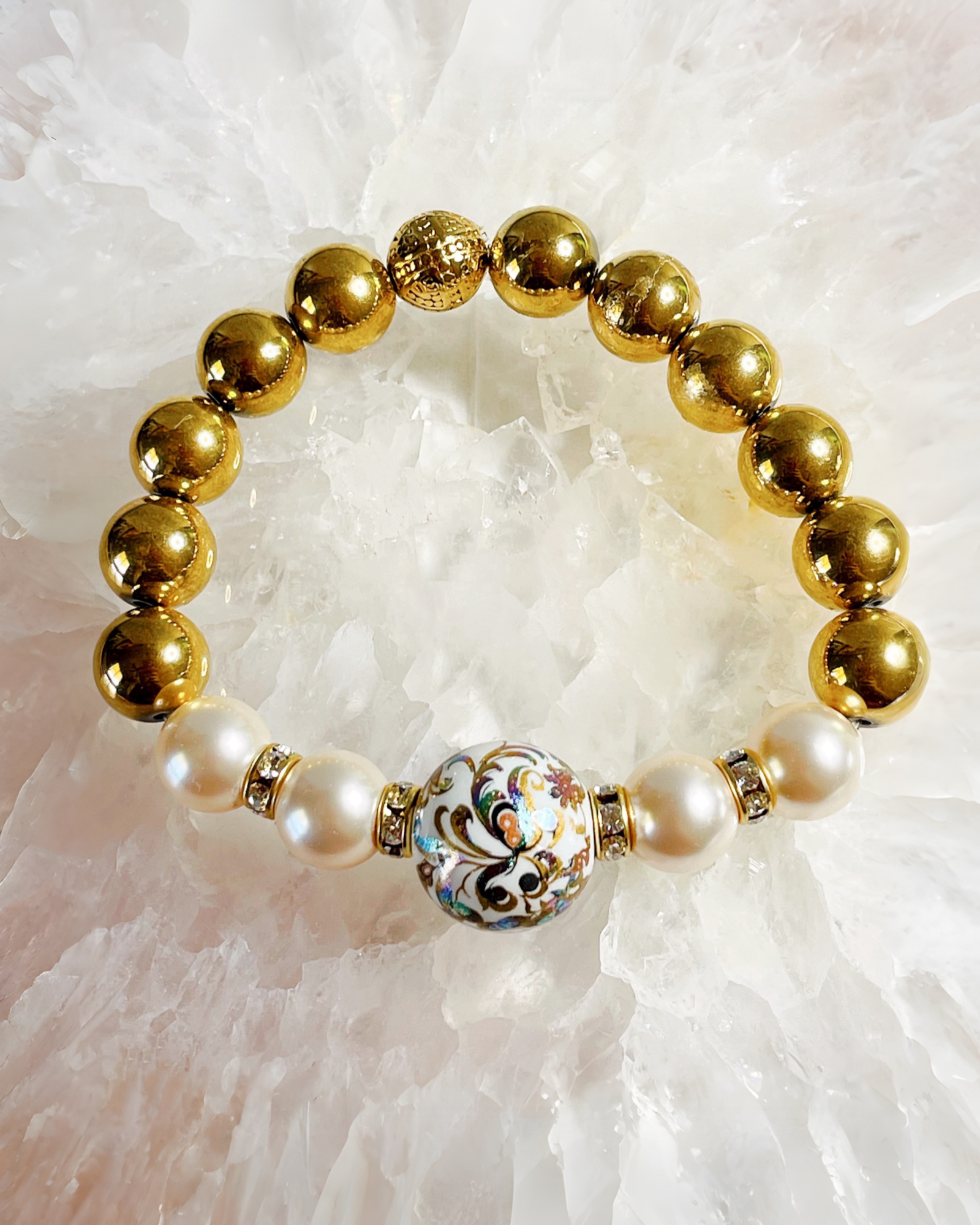 Imperial Blossom Stretch Bracelet by Carabella by Cheryl featuring a rare Japanese Tensha focal bead, Austrian Crystal cream rose pearls, gold-plated hematite beads, and crystal rondelles, handcrafted in Canada.