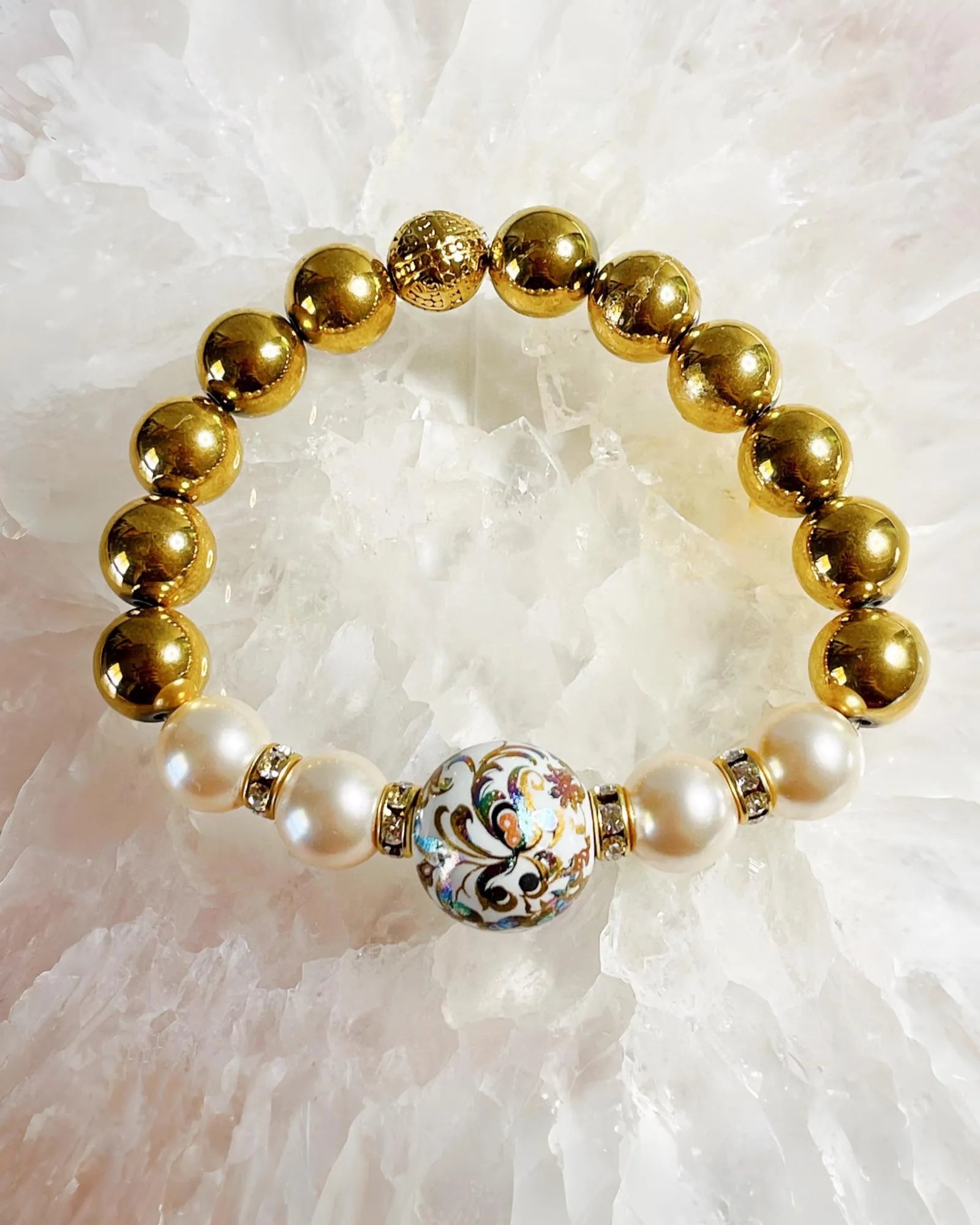 Imperial Blossom Stretch Bracelet by Carabella by Cheryl featuring a rare Japanese Tensha focal bead, Austrian Crystal cream rose pearls, gold-plated hematite beads, and crystal rondelles, handcrafted in Canada.