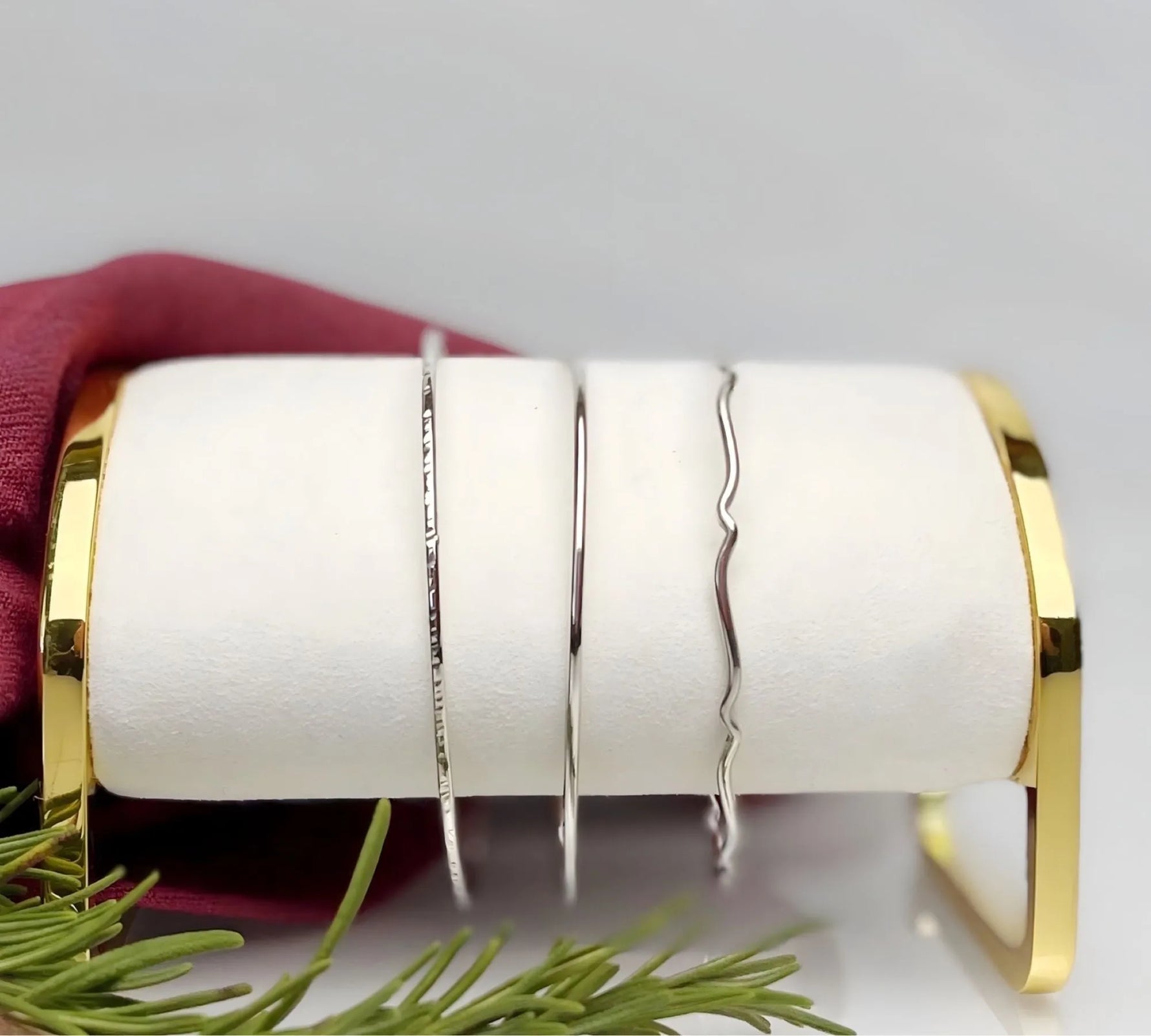 Sterling silver bangle bracelets with hand-textured finishes, minimalist artisan silver bangles by Carabella by Cheryl