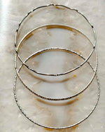Hand-textured sterling silver bangles handcrafted in Canada, Lilith minimalist silver bangle set by Carabella by Cheryl