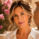 Woman wearing handcrafted sterling silver Morganite Heart Earrings with blush morganite in an elegant editorial portrait.