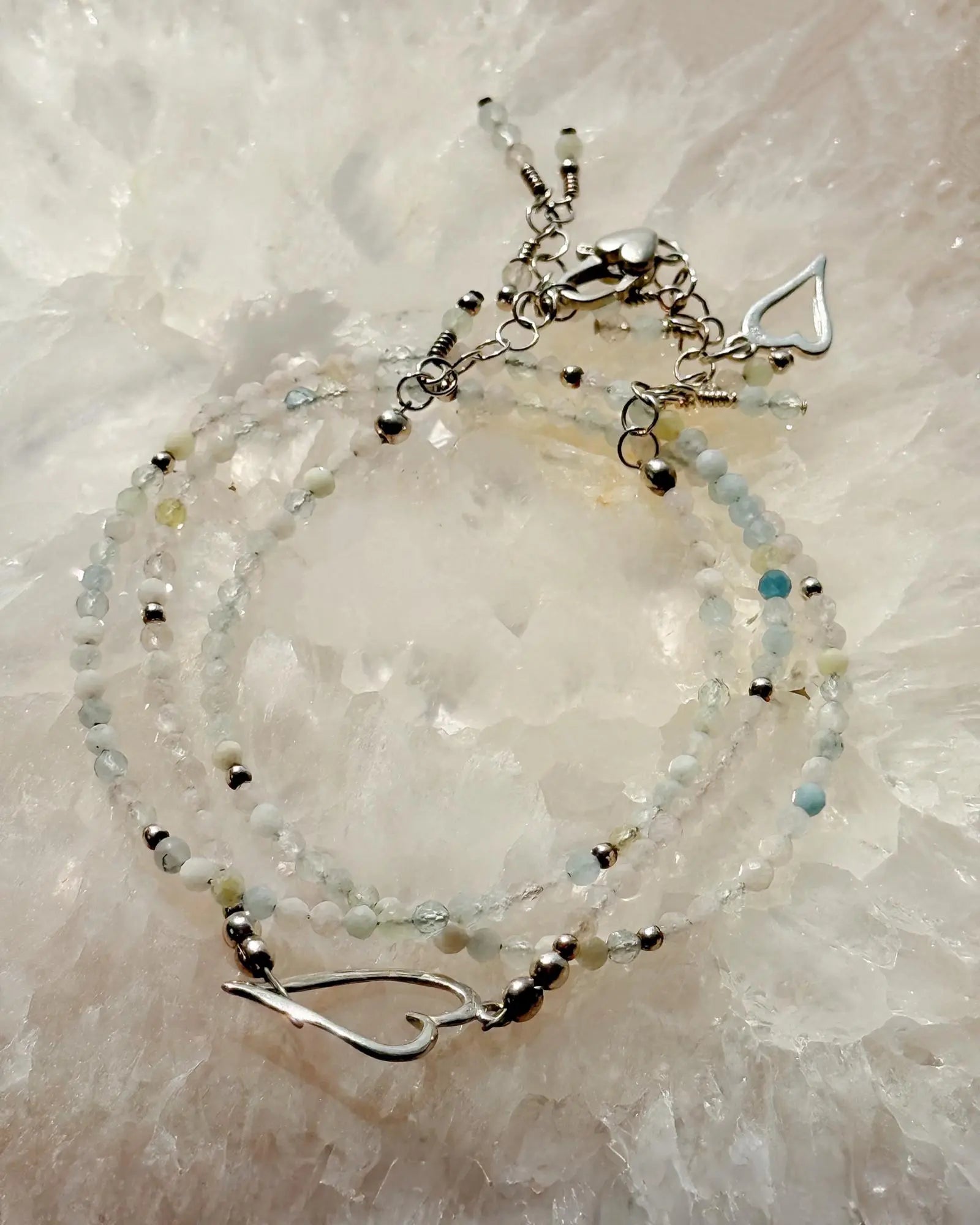 Morganite gemstone silver wrap bracelet with soft blush tones and refined sterling accents by Carabella by Cheryl