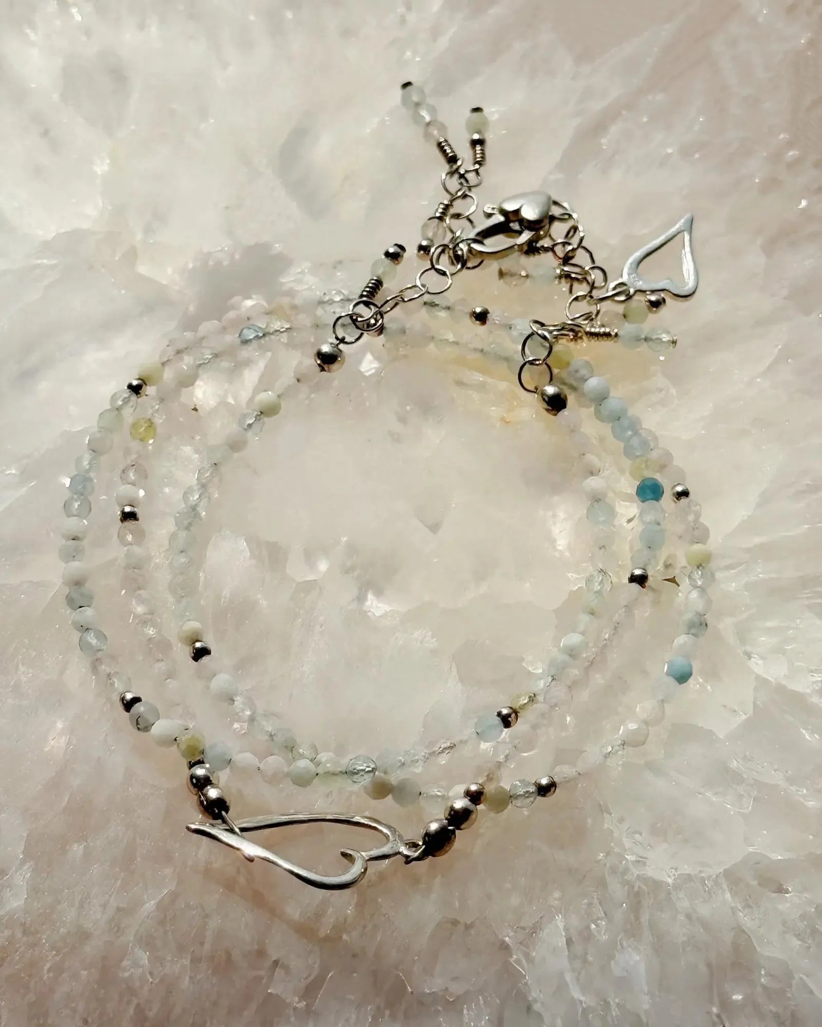 Morganite gemstone silver wrap bracelet with soft blush tones and refined sterling accents by Carabella by Cheryl