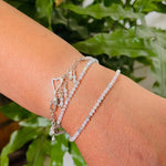 Sterling silver morganite wrap bracelet captured in natural light with refined feminine movement