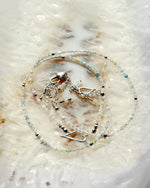 Close-up of morganite gemstone wrap bracelet showcasing sterling silver details and delicate craftsmanship