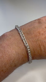 Evelyn Fine Silver Bracelet by Carabella by Cheryl worn on wrist video—handcrafted in Canada from .999 fine silver with a sterling clasp, a timeless expression of quiet luxury and artisan elegance.