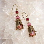 Tulipe Earrings featuring Czech glass floral components, Austrian crystal accents and Vintaj solid brass tulip petals arranged on white quartz crystal.