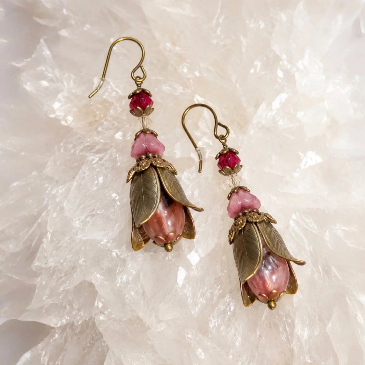 Tulipe Earrings featuring Czech glass floral components, Austrian crystal accents and Vintaj solid brass tulip petals arranged on white quartz crystal.