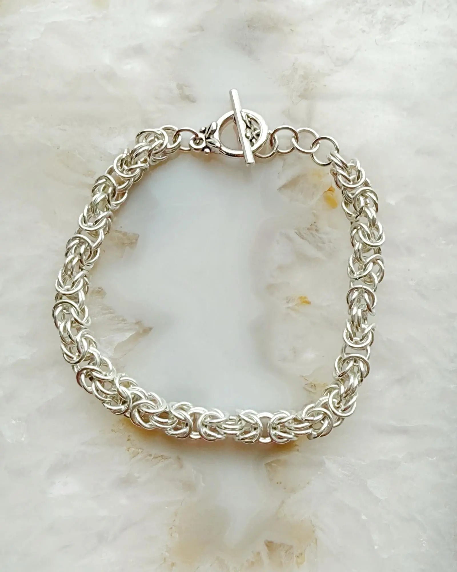 Close-up of the Zoe Byzantine chainmaille bracelet highlighting the intricate sterling silver weave and refined craftsmanship.