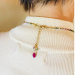 Close up view of the Layla Gemstone Necklace clasp and extension chain featuring coordinating tourmaline and ruby accents.